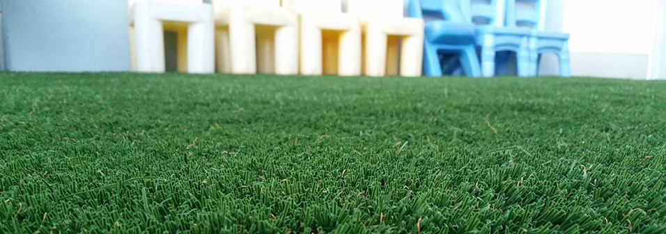 Our dense synthetic grass creates a plush look and a soft surface to play on.